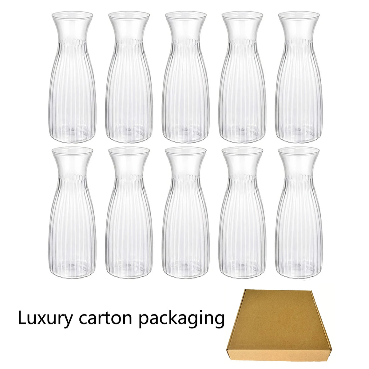 A set of two clear glass vases with vertical ribbed texture displayed above a gold cardboard box.