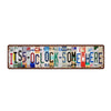 A vintage metal sign with distressed lettering that reads ITS-OCLOCK-SOMEWHERE