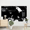A large canvas wall tapestry featuring a dark, dramatic scene with figures and flags.