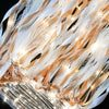 Golden and white LED glow wands with ribbons and bells used for weddings and parties