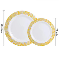 A set of two white plastic dinner and dessert plates with gold rims.