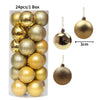 A box containing 24 gold and bronze glitter Christmas tree ornament balls.