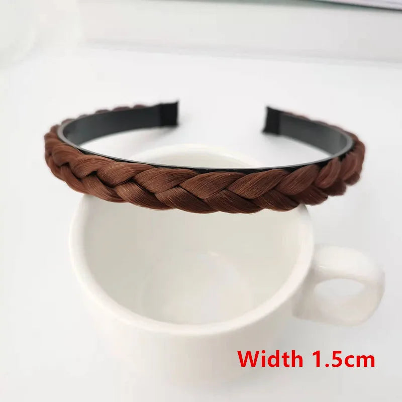 A dark brown braided hair band is shown resting on a white cup, with a dimension of 1.5cm.
