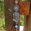 Silver and blue Turkish blue evil eye hamsa hand wall hanging amulet with multiple layered designs