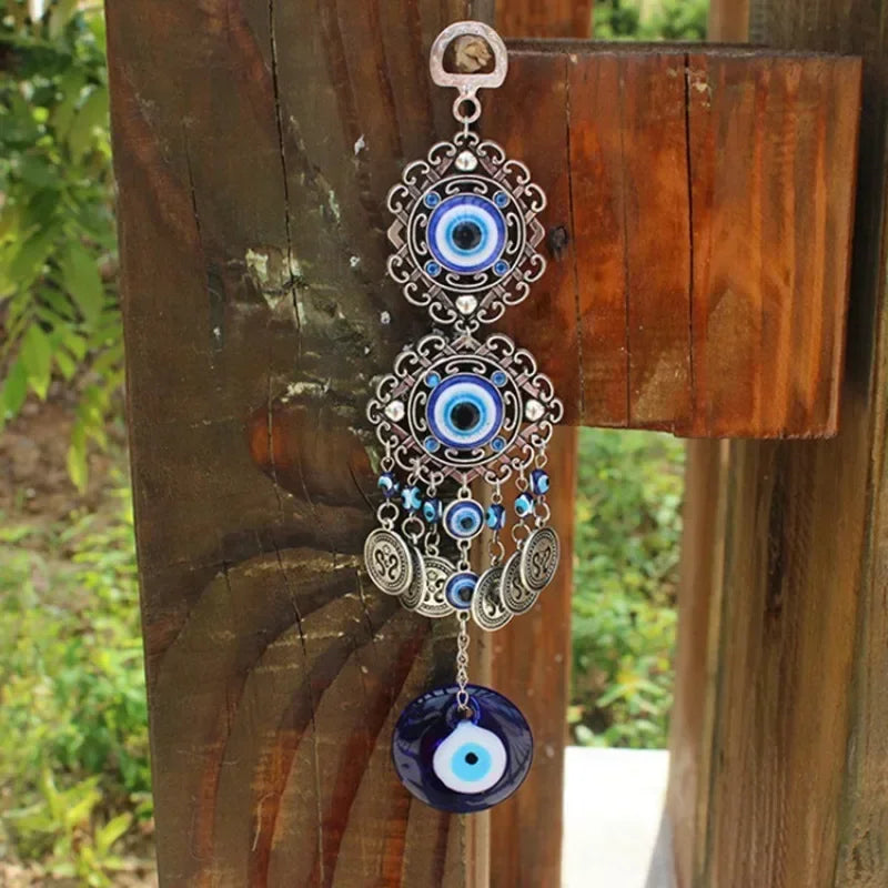 Silver and blue Turkish blue evil eye hamsa hand wall hanging amulet with multiple layered designs