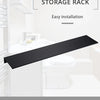 A black storage rack designed for three-dimensional storage, shown in a bathroom or kitchen setting.