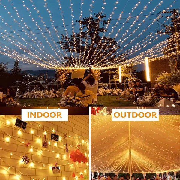 Outdoor event featuring a canopy of warm fairy lights illuminating a gathering.