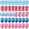 A set of glossy pink and blue balloons filled with confetti for a gender reveal.