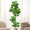 A large artificial ficus tree with green fiddle leaves placed in a white pot indoors.
