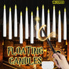 A set of twelve white floating LED candles with a magic wand remote displayed against an ornate background.