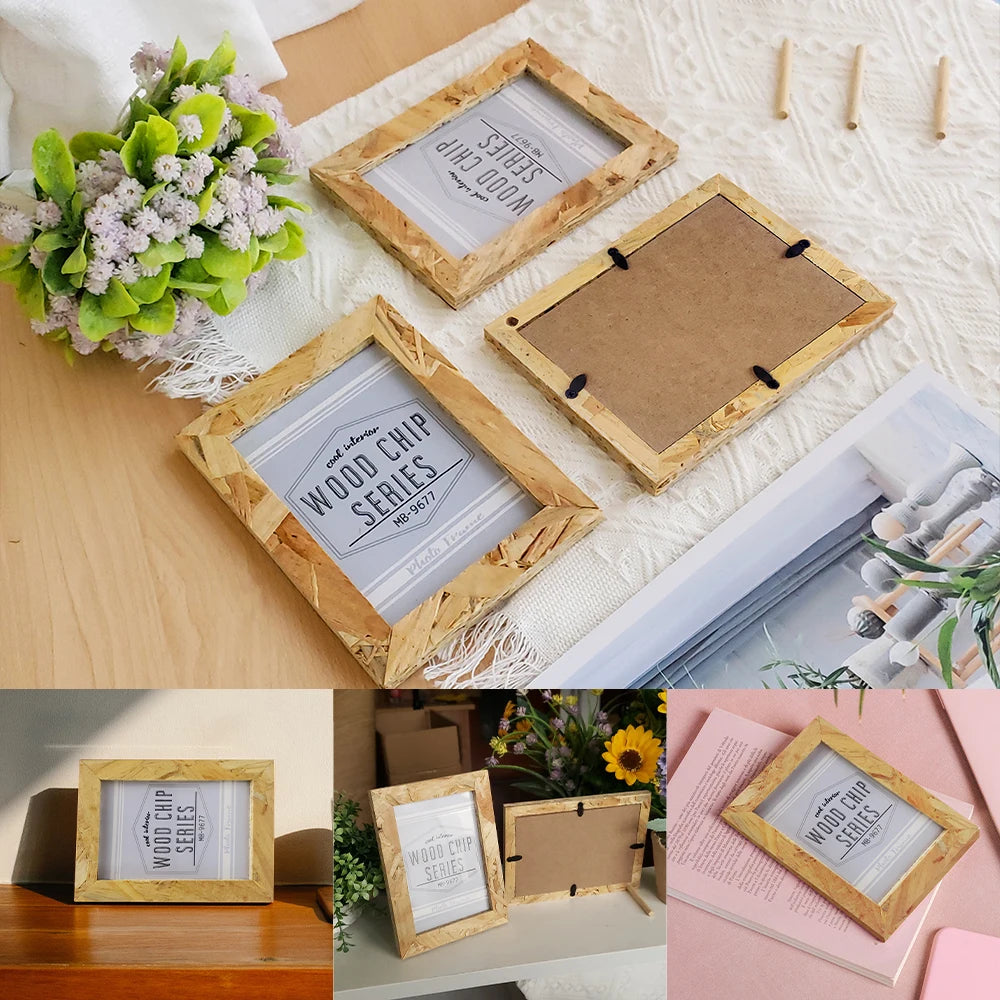 A collection of natural wood rectangular photo frames and a potted plant displayed on a light background.