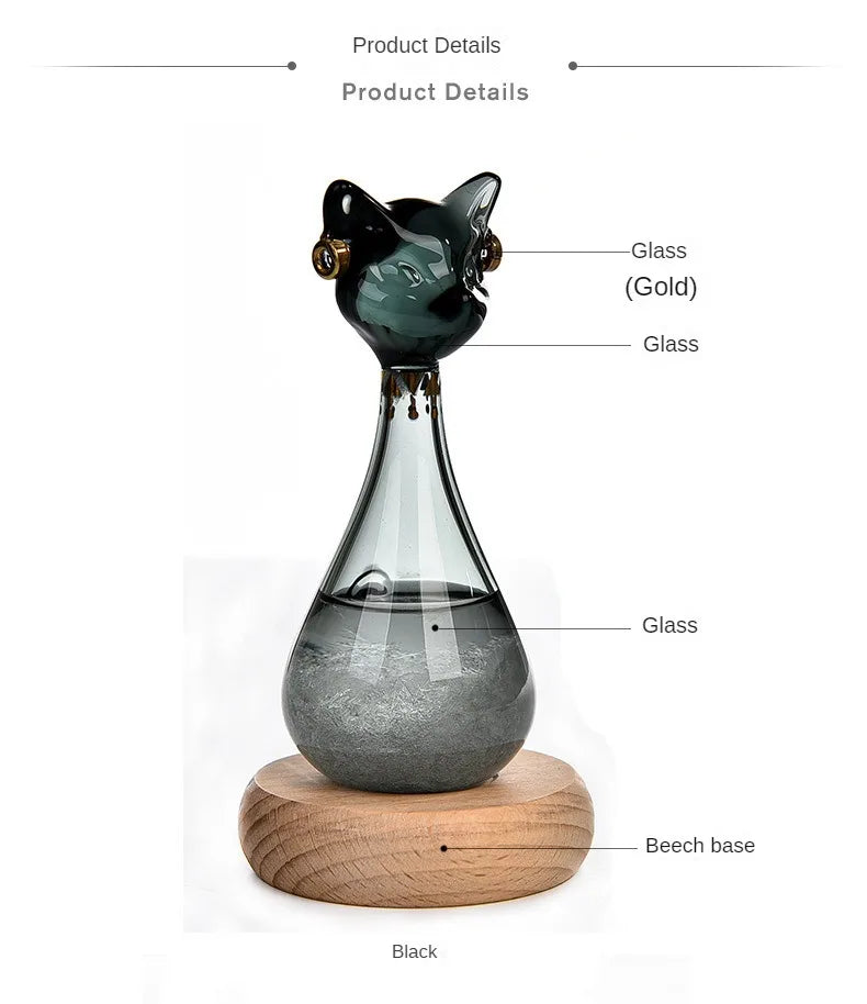 A glass bottle decoration shaped like an Egyptian cat, featuring a dark green top and a clear body on a beech base.