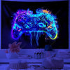 UV reactive game controller tapestry glowing blue and purple on a dark background