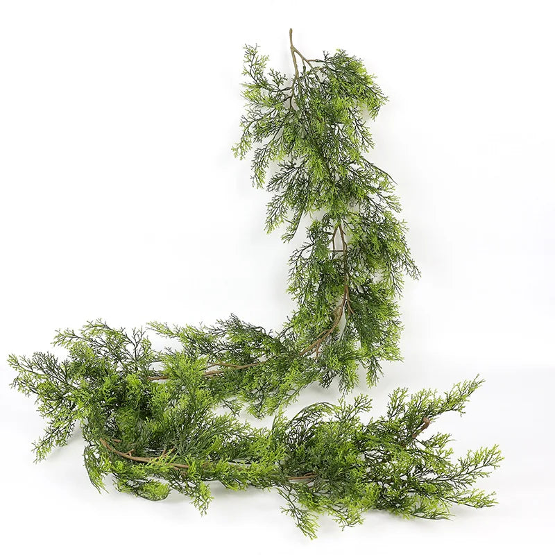 A branch of extra long pine vine used for holiday wreath decoration.