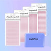 A collection of pink and clear self-adhesive rhinestone embellishments in various sizes and shapes.