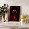 A framed poster featuring a dark red background with a glowing sphere and the text BE THE WORLD IS YOURS.