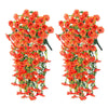 Artificial hanging morning glory flowers in vibrant orange and red with green eucalyptus leaves