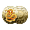 A gold collectible coin featuring a detailed dragon design.
