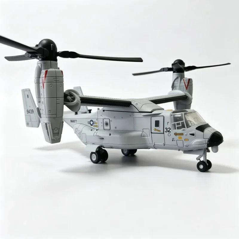 A model of a V-22 Osprey tiltrotor aircraft built from building blocks, shown in a side view.