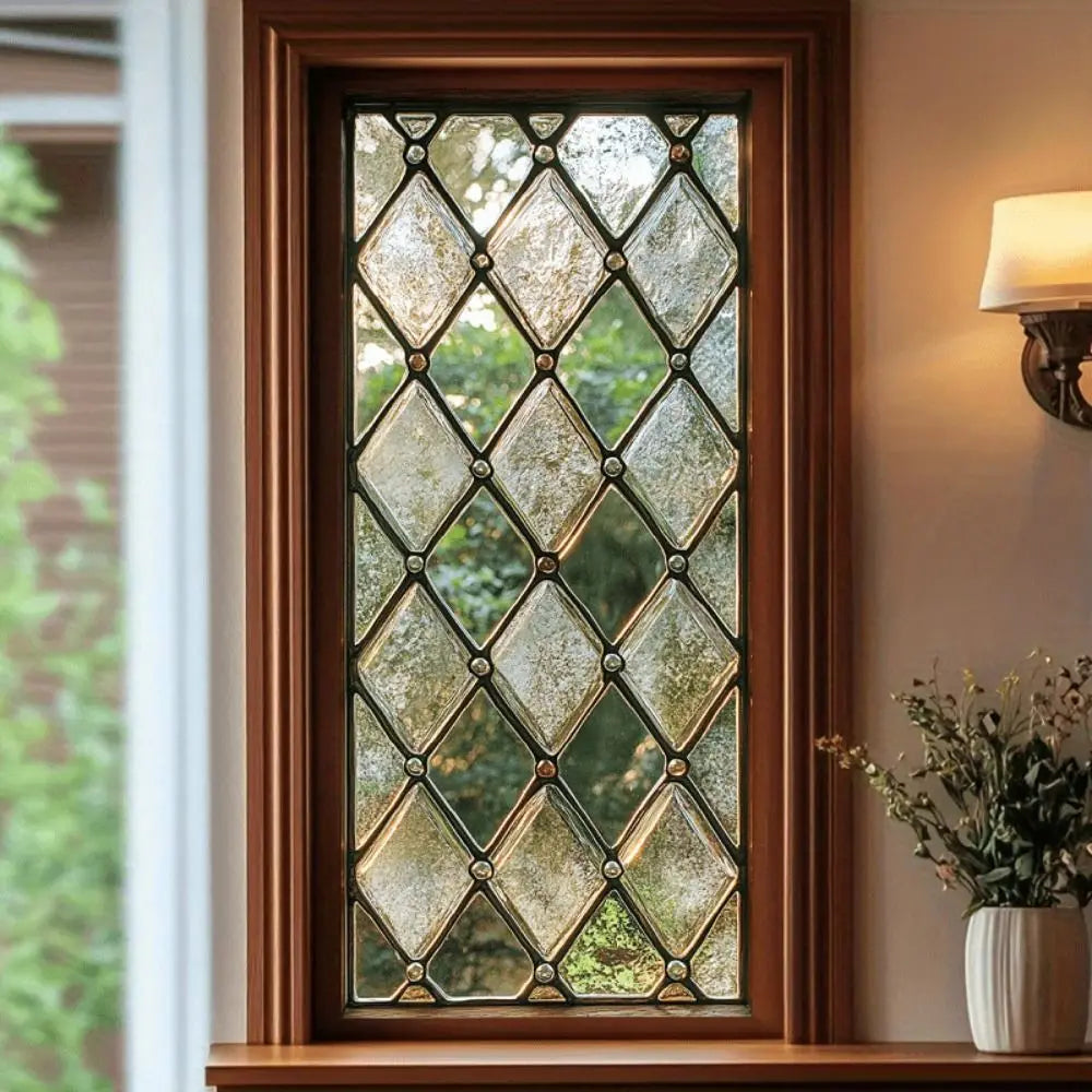 A close-up of a decorative leaded glass window with diamond patterns set in a wooden frame.