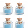 Four soy wax teddy bear candles in glass jars with white ribbon