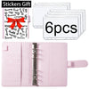 A pink A6 PU leather budget planner binder with cash envelopes and expense sheets