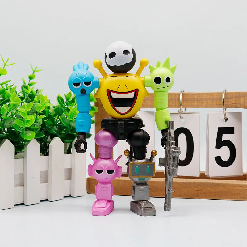 A collection of colorful robot joint mobile assembly worker game dolls and ornaments displayed in front of a wooden box.