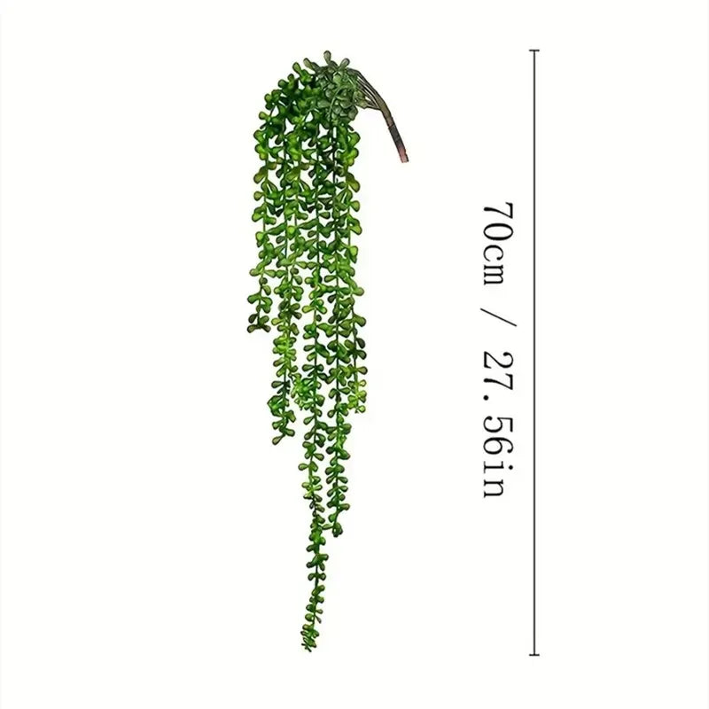 A long, trailing artificial succulent vine with green leaves used for home and wedding decor.