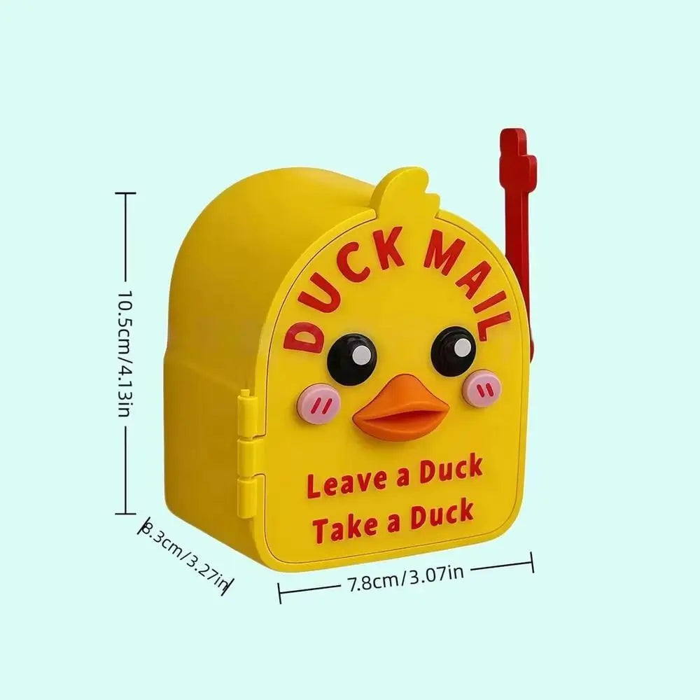 Yellow magnetic duck mailbox cover with a hidden duck, featuring a red handle.