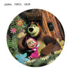 A circular image featuring a cartoon bear and a girl, used as birthday party supplies like plates.
