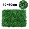 Green artificial grass hedge panels measuring 40x60cm for privacy and decoration