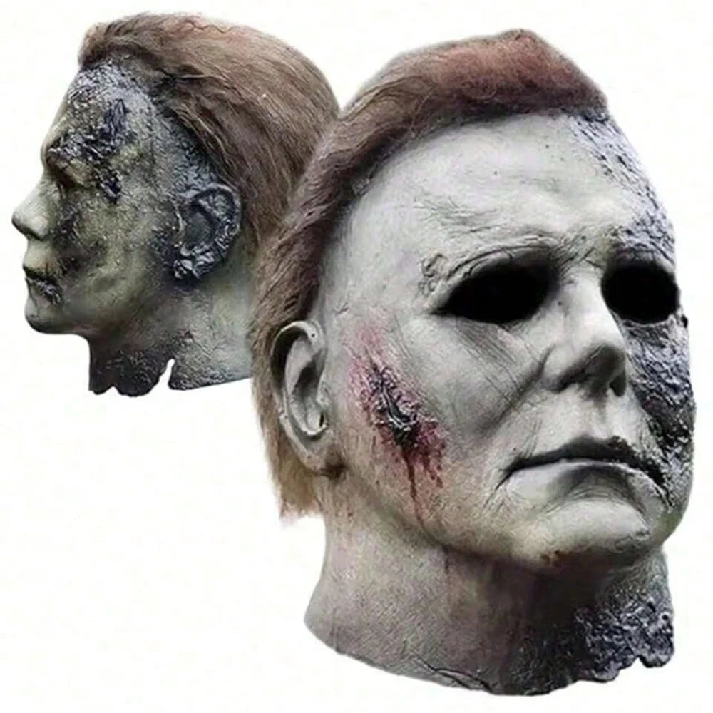 A realistic horror mask of Michael Myers with gray skin and bloodstains, shown in profile and frontal views.
