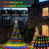 Outdoor lights resembling a star waterfall display on a garden, showing various colored lights.