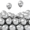A cluster of chrome metallic balloons floating against a white background.