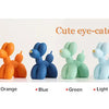 A collection of cute eye-catching colored balloon dog resin sculptures in black, red, orange, blue, green, light blue, white,