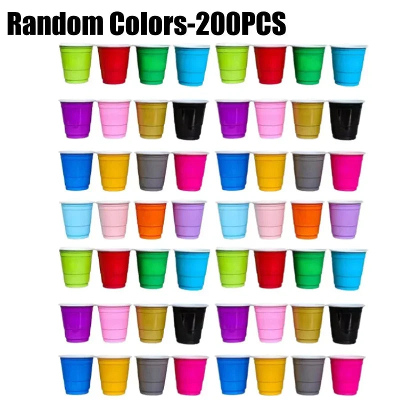 A row of 20 colorful disposable plastic shot cups in various shades are displayed against a white background.