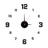 A white clock face with black numbers and hands showing a time, set against a white background.