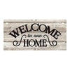 Rustic wooden hanging sign with black script that reads Welcome to our Home