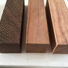 Three rectangular blocks of natural wood blanks for knife handles and DIY projects, showing different grain patterns.