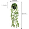 A vertical display of artificial eucalyptus hanging vines in a black pot, measuring 3.15 inches high.