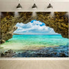 A scenic photo backdrop featuring a turquoise ocean view framed by a natural rock arch and blue sky.