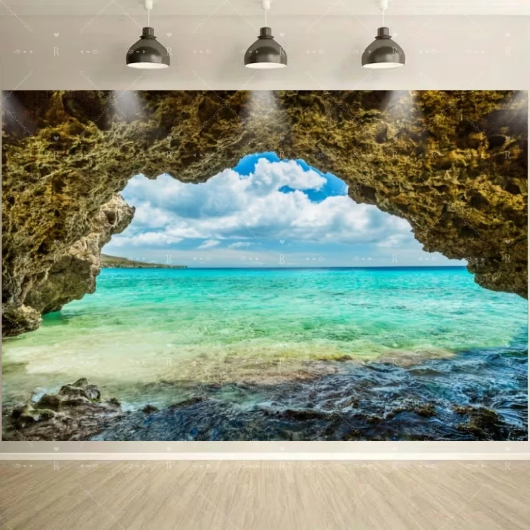 A scenic photo backdrop featuring a turquoise ocean view framed by a natural rock arch and blue sky.