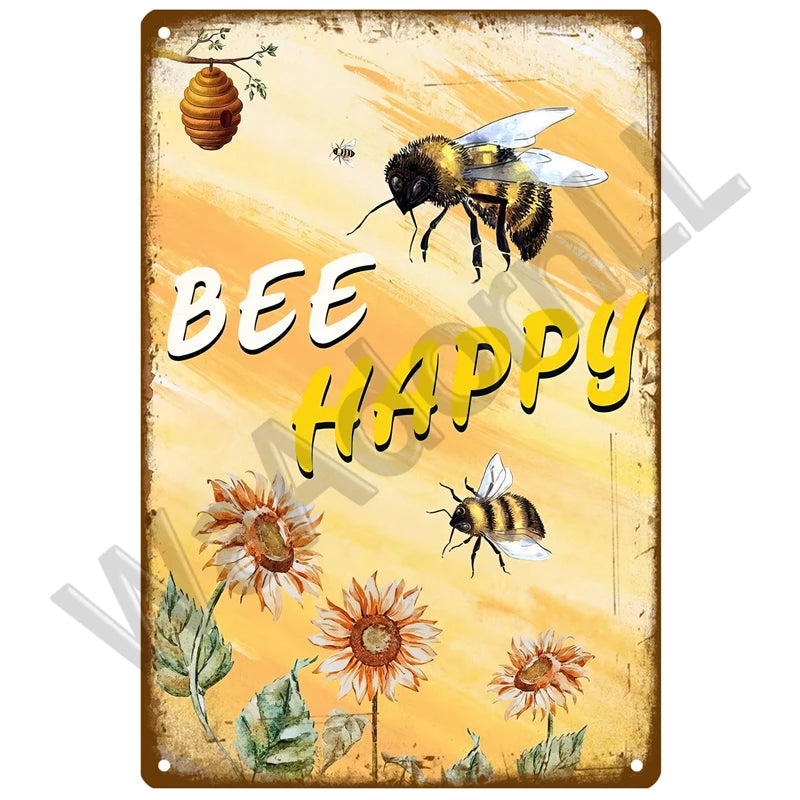 A vintage metal sign featuring a bee and sunflowers with the text BEE HAPPY on an orange background.