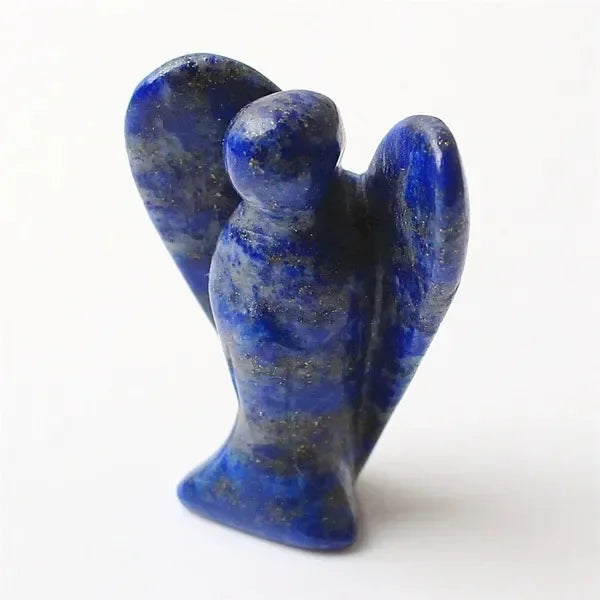Hand-carved blue and gray crystal figurine shaped like an angel.