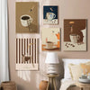 A gallery wall featuring several abstract canvas prints depicting coffee cups and ladders in earthy tones.