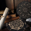 A set of wooden divination tools including a pendulum, a celestial board, and other related items for meditation.