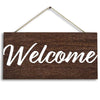 Rustic wooden welcome sign with white script text hanging on a twine