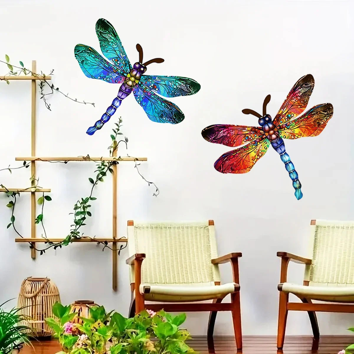 Vintage dragonfly wall art sculpture featuring iridescent blue and green wings mounted on a light gray wall.