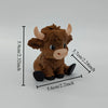 A 3D printed sitting Highland cow statue in brown color with large horns and black hooves.