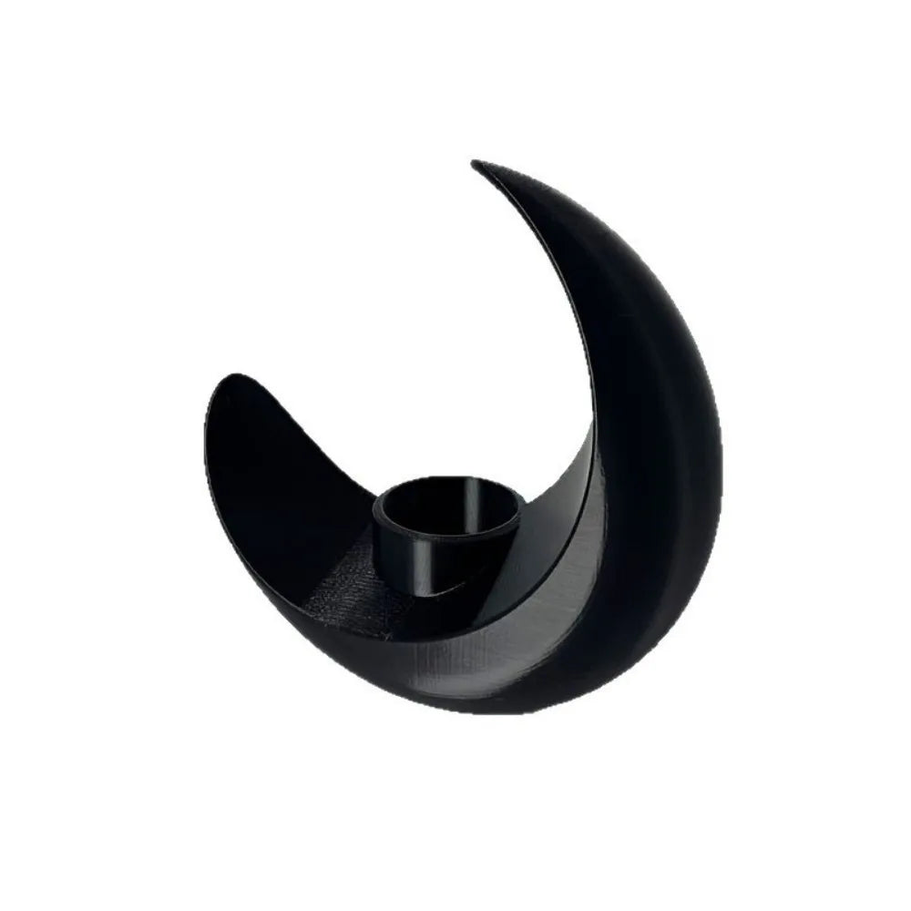 A black, modern moon-shaped decorative vase with a curved opening.